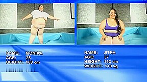2 supersized BBWs fighting in the ring totally naked