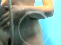 Amateur in beach cabin exposes nice tits and beaver