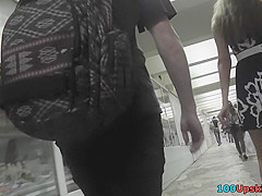 Amateur upskirt clip presents elegant lady in public