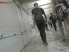Amateur upskirt clip presents elegant lady in public