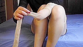 Amputee putting on pantyhose