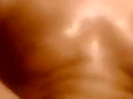 An erotically filmed gangbang with a blonde