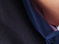 Asian sweetie lets a peek down her blouse