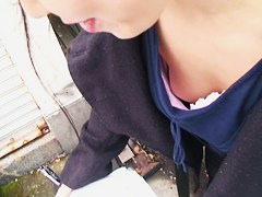 Asian sweetie lets a peek down her blouse