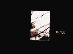 Beautiful Chinese girl exposes her body through the window