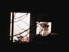 Beautiful Chinese girl exposes her body through the window