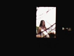 Beautiful Chinese girl exposes her body through the window
