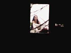 Beautiful Chinese girl exposes her body through the window