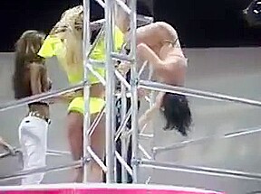 Big breasted women in bikinis and leather pole dancing
