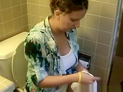 Big tits woman filming her pees