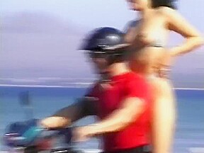Bikini babe picked up by biker