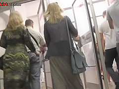 Bitch in skirt and g-string filmed by upskirting