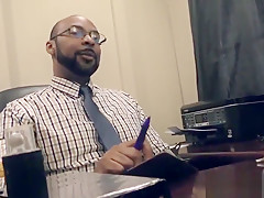 Black doctor removing something from the ass of a white guy