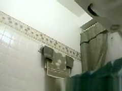 Blond big tit hidden bathroom cam