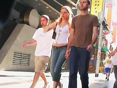 Blonde babe in street candid video