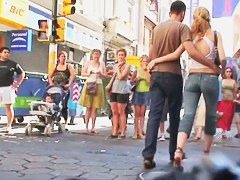 Blonde babe in street candid video