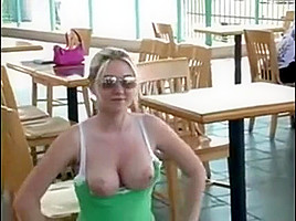 Busty Blonde Is Having Fun Posing Outside And Flashes Her T