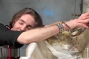 Busty tranny fucks guy in asshole in public toilet