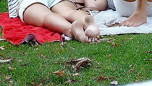 Candid blonde soles in the park!