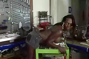 Chocolate tgirl jerks her tool
