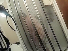 Chubby maid with saggy tits takes a quick shower