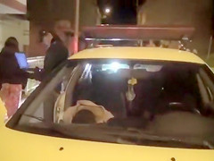 Cops walk a nearly naked criminal down the street
