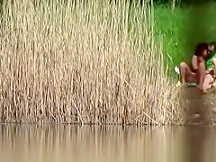 Couple fuck bear the river