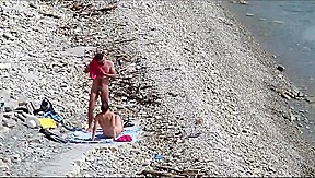 Couple fucked on a public beach while as people walked near