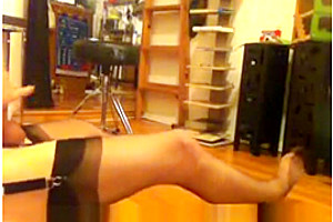 Crossdresser in black nylon stockings