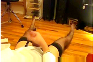Crossdresser in black nylon stockings