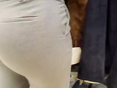 Delicious juicy butts saleswoman in very tight dress pants
