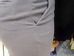 Delicious juicy butts saleswoman in very tight dress pants