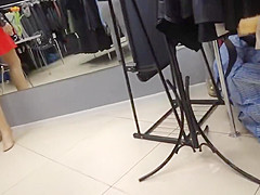 Delicious juicy butts saleswoman in very tight dress pants