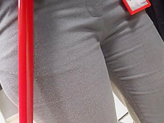 Delicious juicy butts saleswoman in very tight dress pants