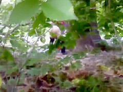 Desperate granny caught peeing in the public park