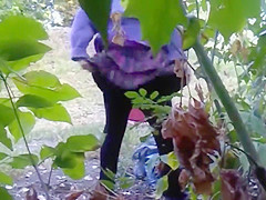 Desperate granny caught peeing in the public park