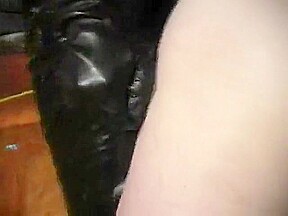 Female fucks male with strapon in latex