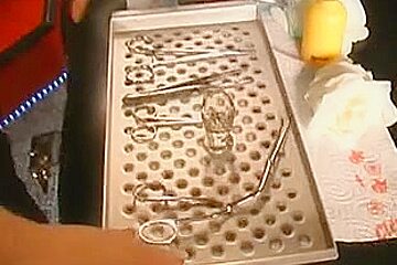First she's fisted, then her labia gets pierced!