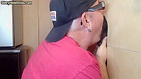 Gloryhole DILF tugs ballsacks during interracial bj
