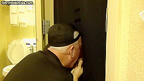 Gloryhole amateur DILF sucks and wanks BFs penis at home