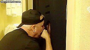 Gloryhole amateur DILF sucks and wanks BFs penis at home