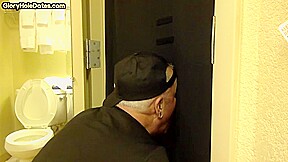 Gloryhole amateur DILF sucks and wanks BFs penis at home