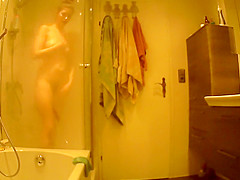 Hairy beauty spied in the shower