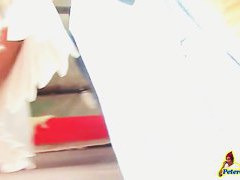 Hidden upskirt camera follows hot brunette with a fat ass
