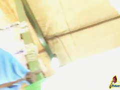 Hidden upskirt camera follows hot brunette with a fat ass