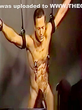 Hot guy strung up and tortured