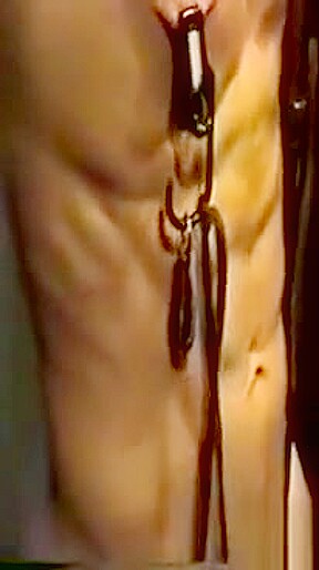 Hot guy strung up and tortured