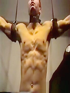 Hot guy strung up and tortured