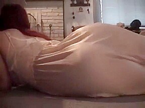 Hot mature shaking her ass in a satin nightgown 
