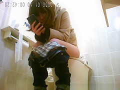 Japanese women caught by hidden in toilet